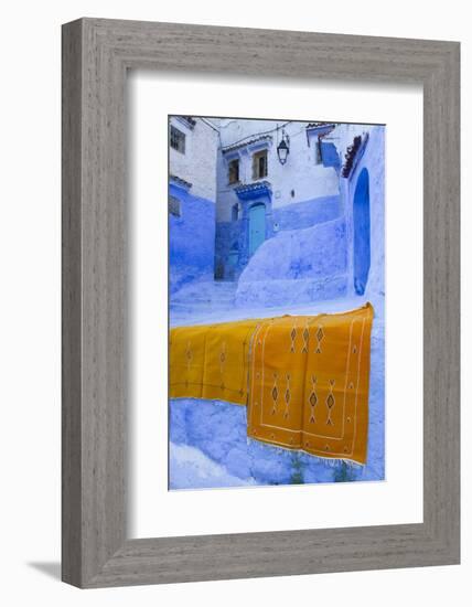 Africa, Morocco, Chefchaouen. Rugs Draped on a Wall in the Blue Town-Brenda Tharp-Framed Photographic Print