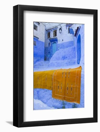 Africa, Morocco, Chefchaouen. Rugs Draped on a Wall in the Blue Town-Brenda Tharp-Framed Photographic Print