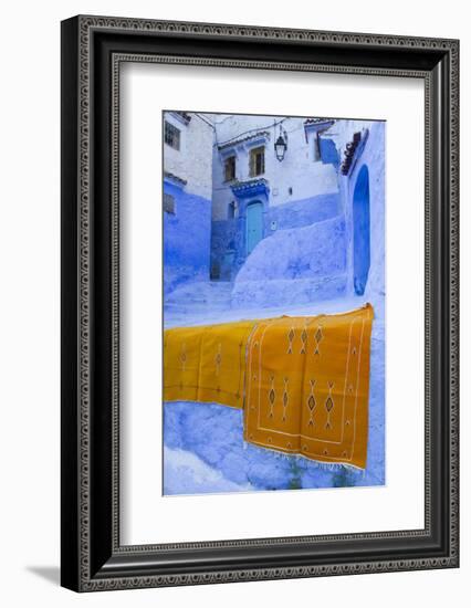 Africa, Morocco, Chefchaouen. Rugs Draped on a Wall in the Blue Town-Brenda Tharp-Framed Photographic Print