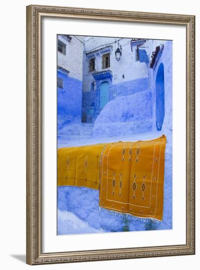 Africa, Morocco, Chefchaouen. Rugs Draped on a Wall in the Blue Town-Brenda Tharp-Framed Photographic Print