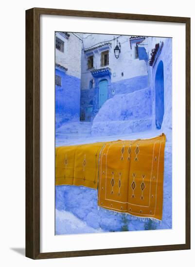 Africa, Morocco, Chefchaouen. Rugs Draped on a Wall in the Blue Town-Brenda Tharp-Framed Photographic Print