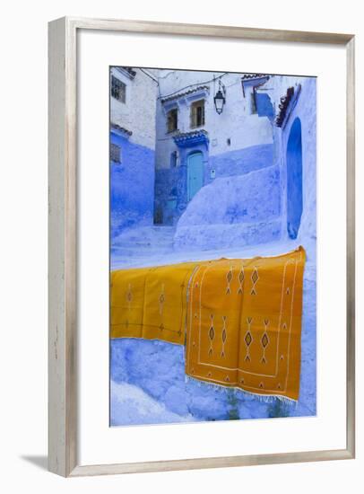 Africa, Morocco, Chefchaouen. Rugs Draped on a Wall in the Blue Town-Brenda Tharp-Framed Photographic Print