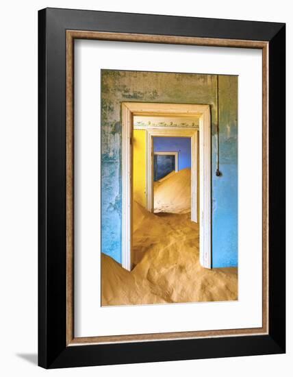 Africa, Namibia, Kolmanskop. Doorways and drifting sand in an abandoned diamond mining town.-Jaynes Gallery-Framed Photographic Print