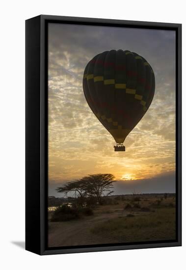 Africa. Tanzania. Hot air balloon crossing the Mara River, Serengeti National Park.-Ralph H. Bendjebar-Framed Premier Image Canvas