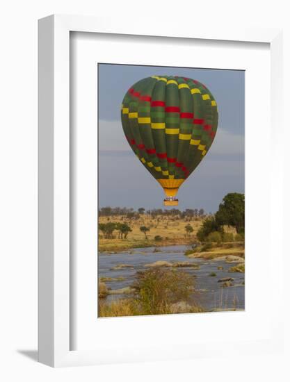 Africa. Tanzania. Hot air balloon crossing the Mara River, Serengeti National Park.-Ralph H. Bendjebar-Framed Photographic Print