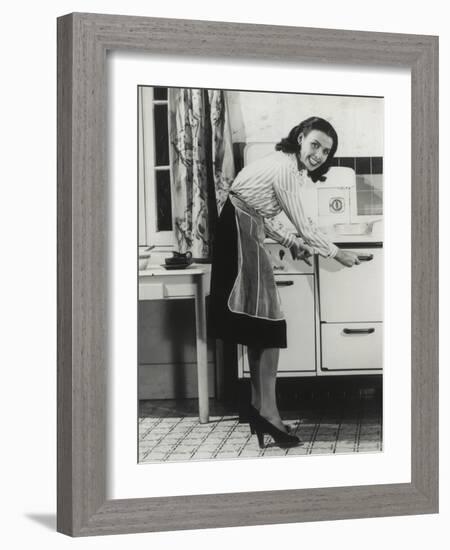 African American Actress Lena Horne at a Gas Stove-null-Framed Photo