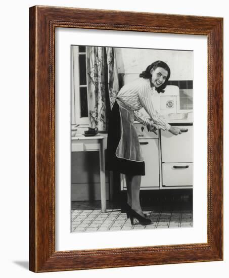 African American Actress Lena Horne at a Gas Stove-null-Framed Photo