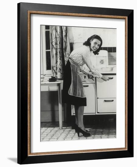 African American Actress Lena Horne at a Gas Stove-null-Framed Photo