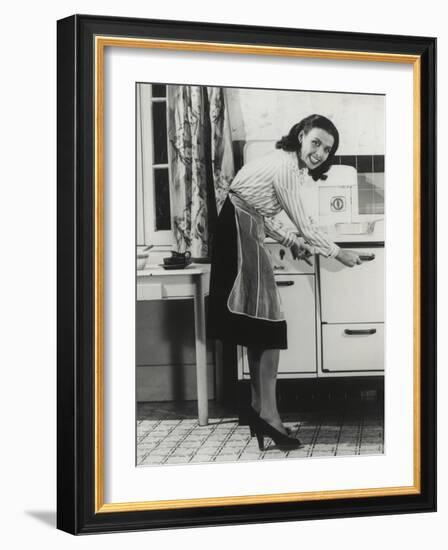 African American Actress Lena Horne at a Gas Stove-null-Framed Photo