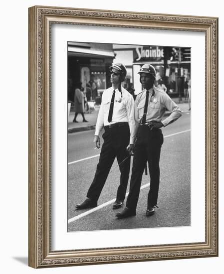 African American and Caucasian Cops on Duty During Hospital Strikers' Protest March-null-Framed Photographic Print