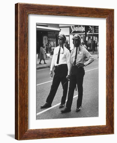 African American and Caucasian Cops on Duty During Hospital Strikers' Protest March-null-Framed Photographic Print