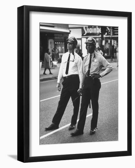 African American and Caucasian Cops on Duty During Hospital Strikers' Protest March-null-Framed Photographic Print