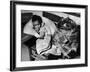 African American Baby Next to Cage of Canaries in a Shelter at School During Severe Flooding-Margaret Bourke-White-Framed Photographic Print