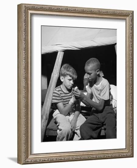 African American Camper Helps a White Bubby with His Bandaged Hand-Gordon Parks-Framed Photo