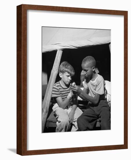 African American Camper Helps a White Bubby with His Bandaged Hand-Gordon Parks-Framed Photo