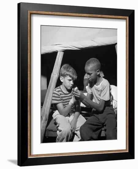 African American Camper Helps a White Bubby with His Bandaged Hand-Gordon Parks-Framed Photo