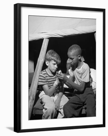 African American Camper Helps a White Bubby with His Bandaged Hand-Gordon Parks-Framed Photo