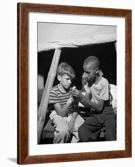 African American Camper Helps a White Bubby with His Bandaged Hand-Gordon Parks-Framed Photo