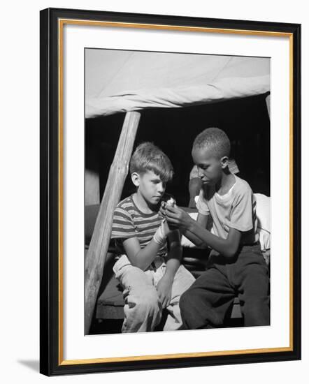 African American Camper Helps a White Bubby with His Bandaged Hand-Gordon Parks-Framed Photo