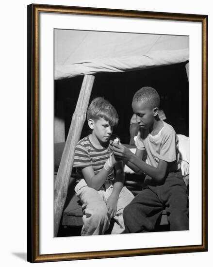 African American Camper Helps a White Bubby with His Bandaged Hand-Gordon Parks-Framed Photo