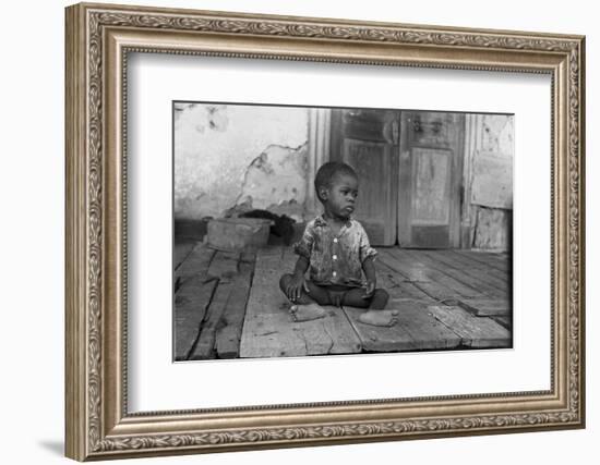 African American Child on a Dilapidated Porch, Louisiana, September, 1938-null-Framed Photo