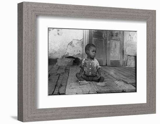 African American Child on a Dilapidated Porch, Louisiana, September, 1938-null-Framed Photo