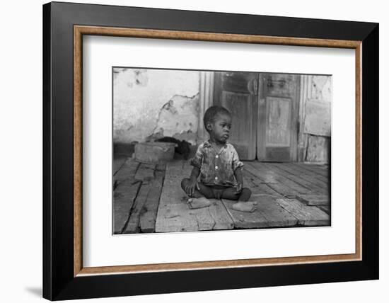 African American Child on a Dilapidated Porch, Louisiana, September, 1938-null-Framed Photo