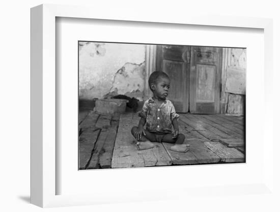 African American Child on a Dilapidated Porch, Louisiana, September, 1938-null-Framed Photo