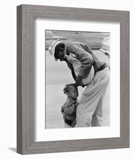 African American Man Comforts Crying Child Photograph-Lantern Press-Framed Art Print