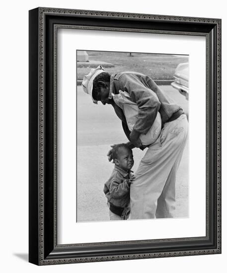 African American Man Comforts Crying Child Photograph-Lantern Press-Framed Art Print