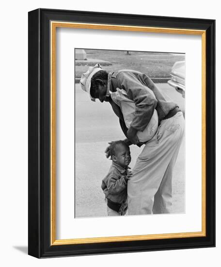 African American Man Comforts Crying Child Photograph-Lantern Press-Framed Art Print