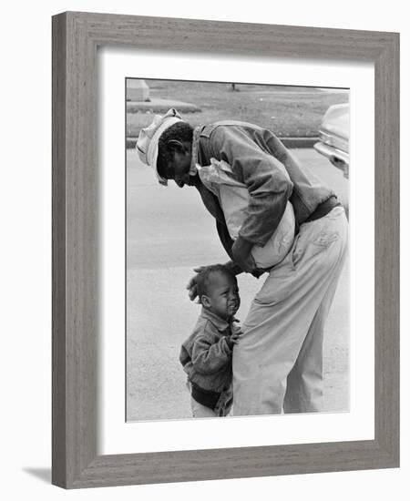 African American Man Comforts Crying Child Photograph-Lantern Press-Framed Art Print