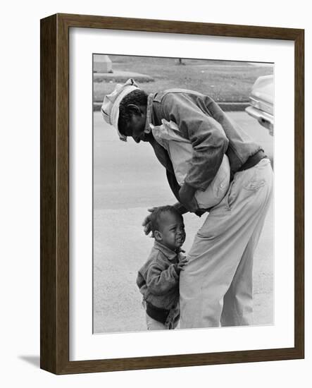 African American Man Comforts Crying Child Photograph-Lantern Press-Framed Art Print