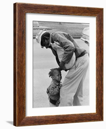 African American Man Comforts Crying Child Photograph-Lantern Press-Framed Art Print