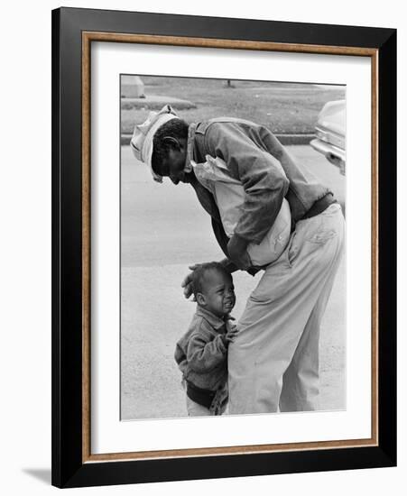 African American Man Comforts Crying Child Photograph-Lantern Press-Framed Art Print