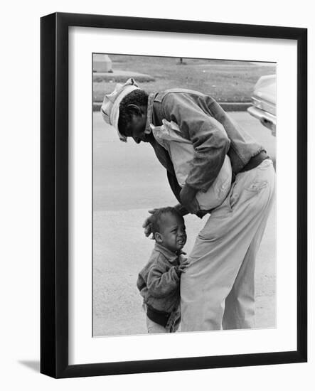 African American Man Comforts Crying Child Photograph-Lantern Press-Framed Art Print