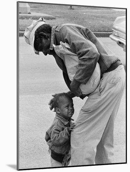 African American Man Comforts Crying Child Photograph-Lantern Press-Mounted Art Print