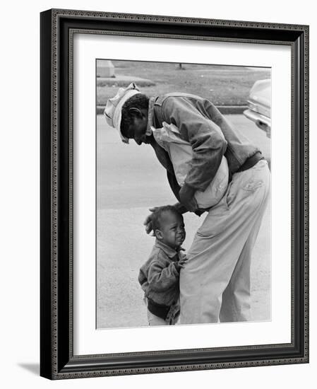 African American Man Comforts Crying Child Photograph-Lantern Press-Framed Art Print