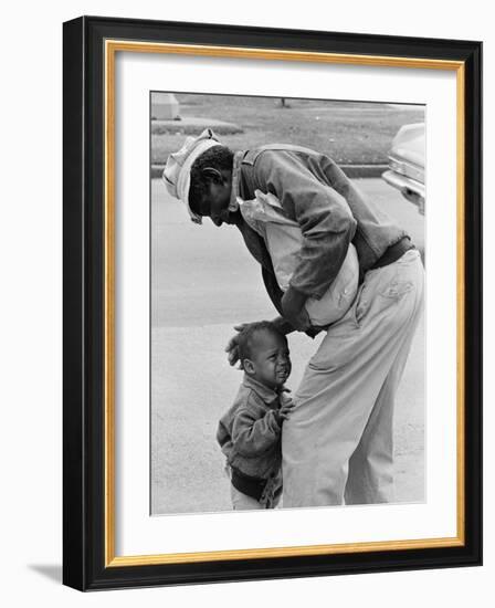 African American Man Comforts Crying Child Photograph-Lantern Press-Framed Art Print