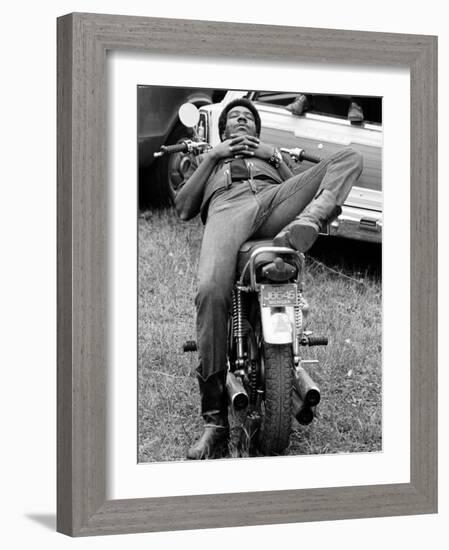 African American Man Relaxing on His Motocycle During Motorcycle Races near Detroit, Michigan-John Shearer-Framed Photographic Print