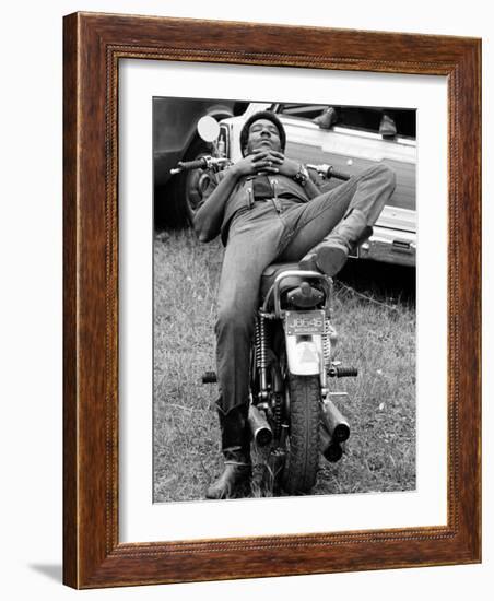 African American Man Relaxing on His Motocycle During Motorcycle Races near Detroit, Michigan-John Shearer-Framed Photographic Print