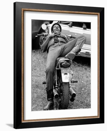 African American Man Relaxing on His Motocycle During Motorcycle Races near Detroit, Michigan-John Shearer-Framed Photographic Print