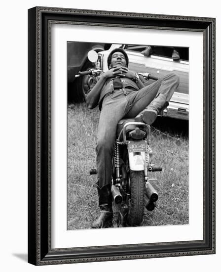 African American Man Relaxing on His Motocycle During Motorcycle Races near Detroit, Michigan-John Shearer-Framed Photographic Print