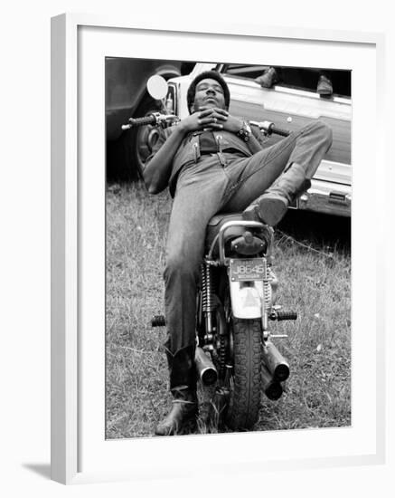 African American Man Relaxing on His Motocycle During Motorcycle Races near Detroit, Michigan-John Shearer-Framed Photographic Print