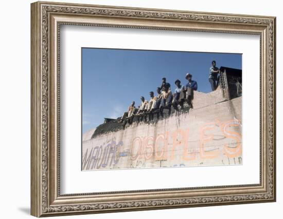 African American Members of the Street Gang 'Devil's Disciples' on a Graffiti Wall, 1968-Declan Haun-Framed Photographic Print