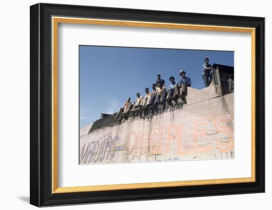 African American Members of the Street Gang 'Devil's Disciples' on a Graffiti Wall, 1968-Declan Haun-Framed Photographic Print