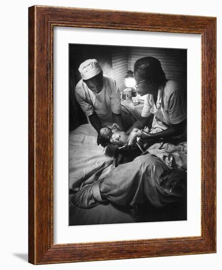 African American Midwife Maude Callen Delivering a Baby-W^ Eugene Smith-Framed Photographic Print