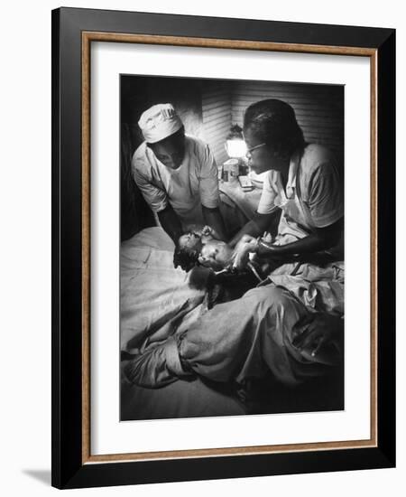 African American Midwife Maude Callen Delivering a Baby-W^ Eugene Smith-Framed Photographic Print