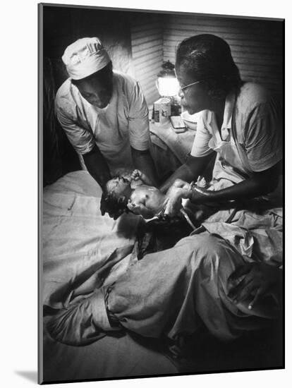 African American Midwife Maude Callen Delivering a Baby-W^ Eugene Smith-Mounted Photographic Print