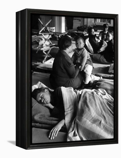 African American Refugees Left Homeless After Severe Flooding Sleep in Temporary Relief Station-Margaret Bourke-White-Framed Premier Image Canvas
